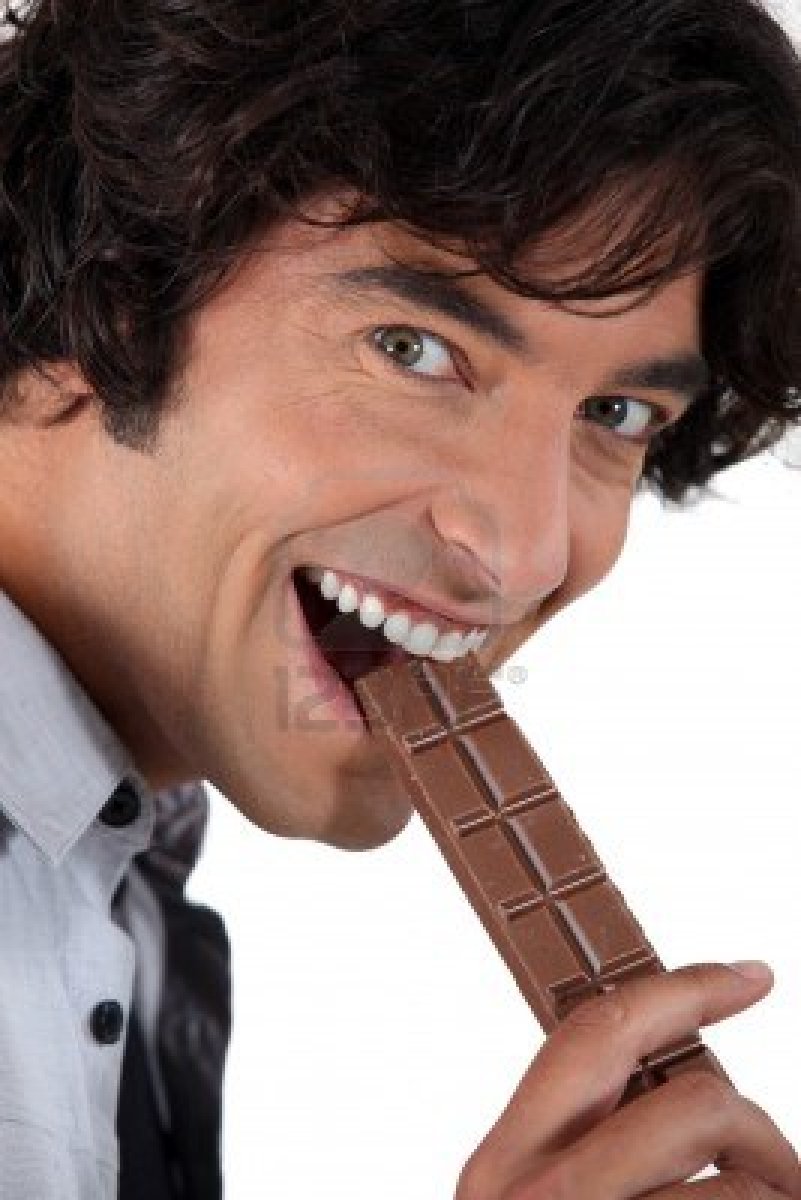 15718379-man-with-a-bar-of-chocolate.jpg