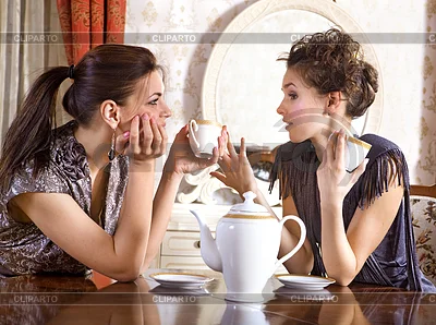 3517777-two-pretty-girl-friends-drink-tea.webp