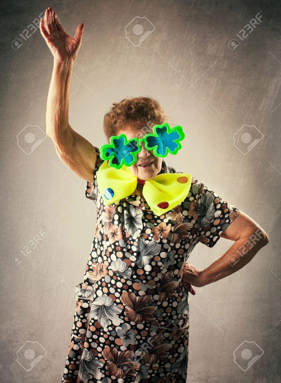35801890-Merry-old-woman-Happy-fun-granny-Adult-funny-dancing-female--Stock-Photo.webp