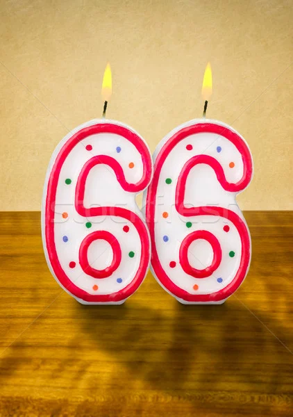 3985631_stock-photo-burning-birthday-candles-number-66.webp