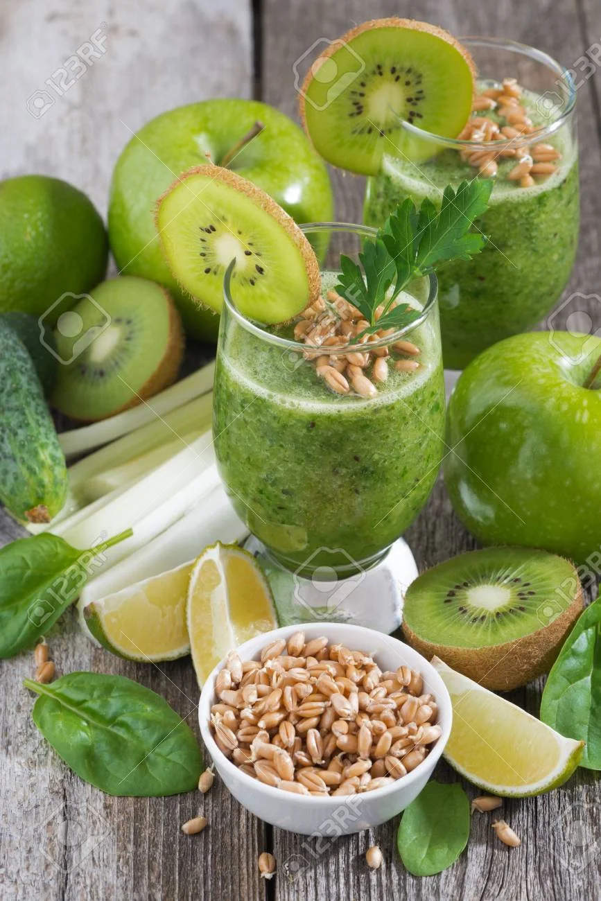 42714208-healthy-green-smoothie-with-sprouts-on-a-wooden-table-vertical-top-view.webp