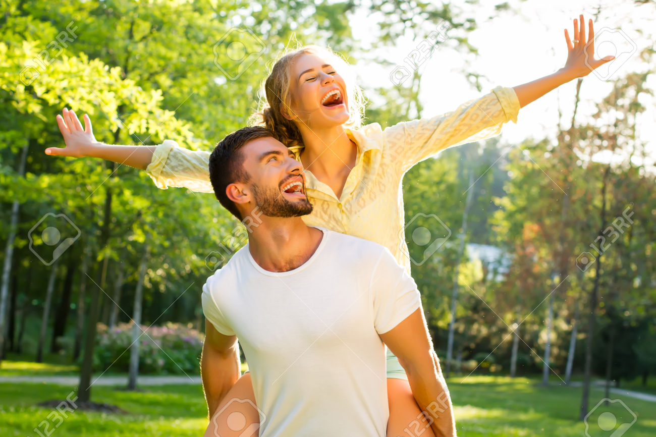 48857031-Happy-couple-on-vacation-Lovers-are-laughing-Happy-guy-and--Stock-Photo.jpg