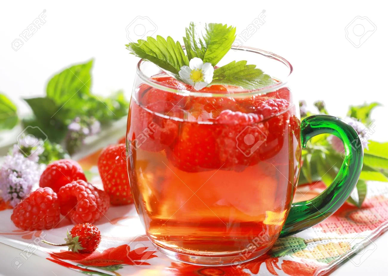 5416623-Refreshing-summer-ice-tea-with-fruits-and-herbs-Stock-Photo.webp