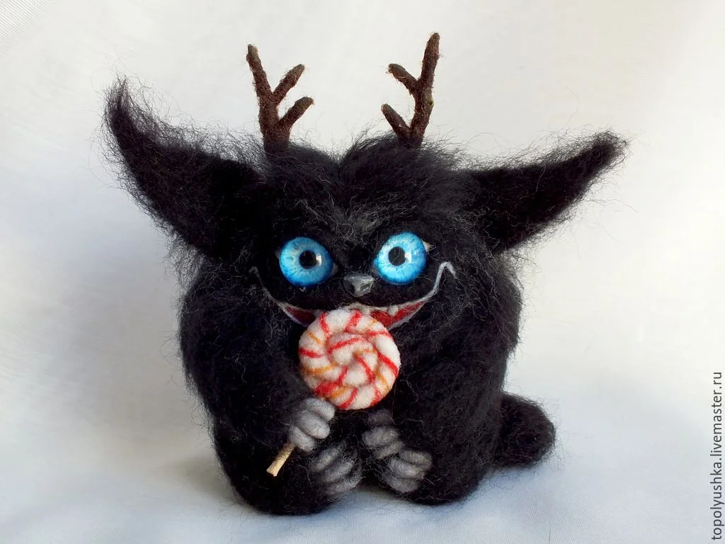 73cea7187d36831d518ef7461boe--kukly-igrushki-chernyj-pushistyj (1).webp