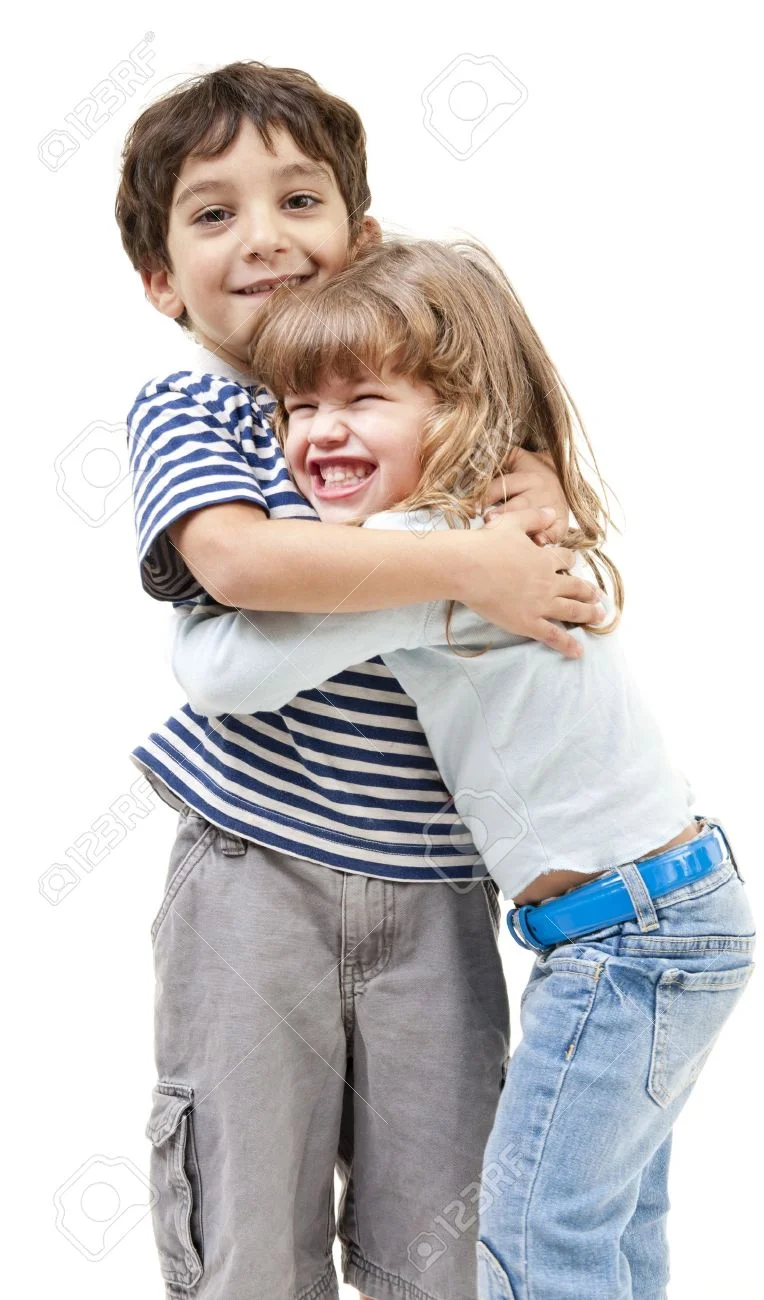 7955575-little-boy-and-girl-hugging-isolated-on-white-Stock-Photo.webp