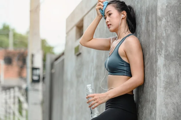 asian-woman-tired-sport-exercises-she-using-towel-wipes-sweat-from-her-face-she-standing-in-t...webp