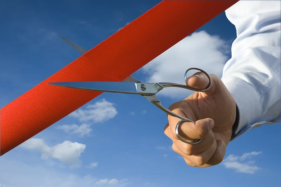bigstockphoto_Cut_Of_The_Red_Ribbon_2854296.webp