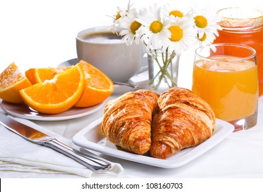 breakfast-croissants-orange-juice-coffee-260nw-108160703.jpg