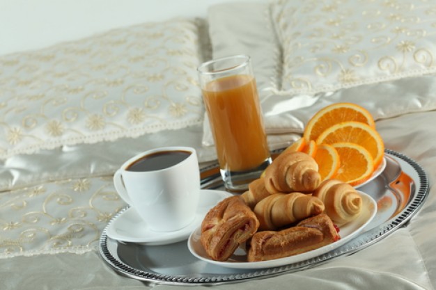 breakfast-in-bed-white-background-coffee-saucers_3330322.jpg