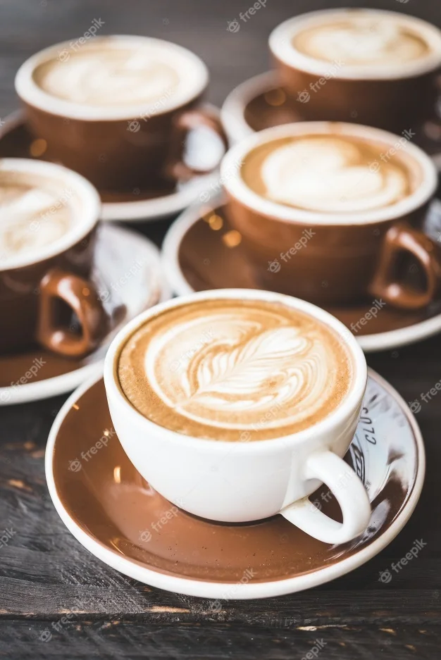 cup-of-coffee-with-floral-decoration_1203-1628.webp