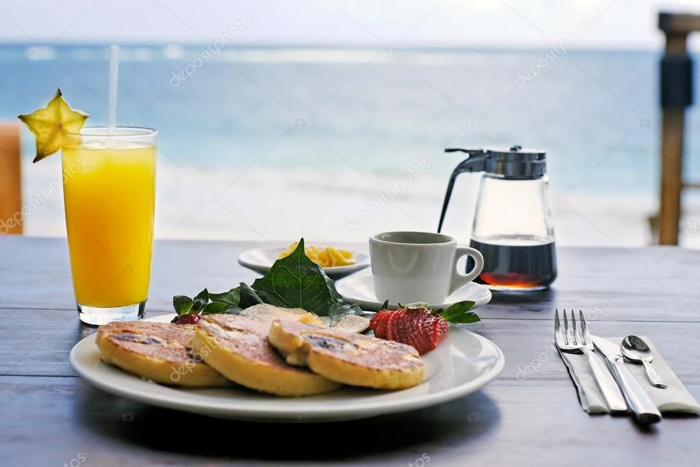 depositphotos_10150174-stock-photo-breakfast.webp