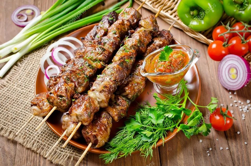 depositphotos_106218382-stock-photo-grilled-beef-liver-kebabs-on.webp