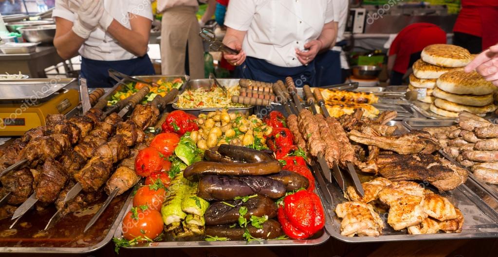 depositphotos_108238328-stock-photo-customers-choosing-meat-and-vegetables.jpg