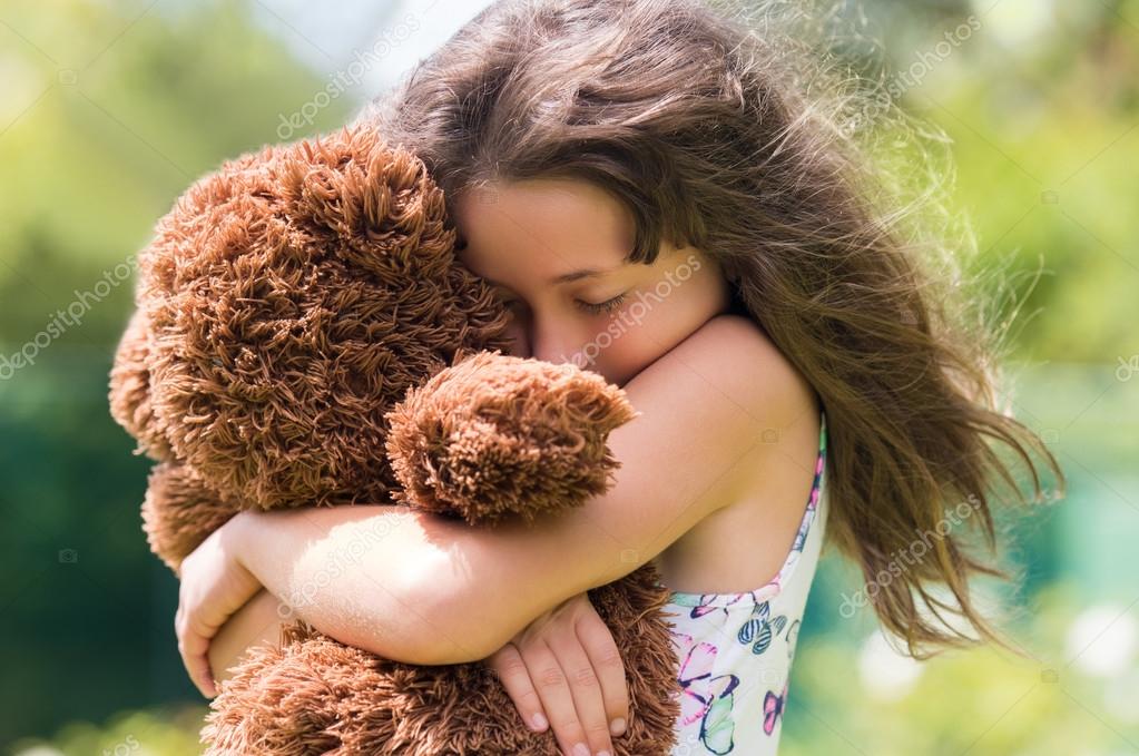 depositphotos_108625586-stock-photo-girl-hugging-teddy-bear.jpg