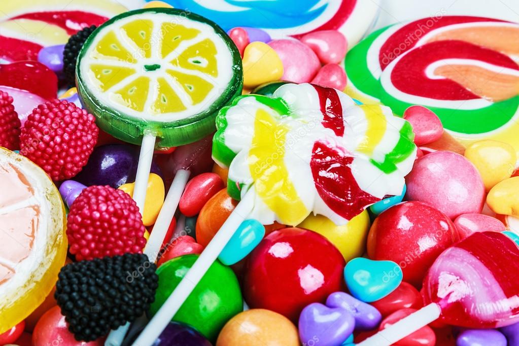 depositphotos_108821772-stock-photo-multicolored-lollipops-candies.jpg