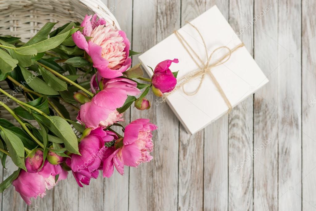 depositphotos_110640366-stock-photo-beautiful-flowers-peonies-in-basket.jpg