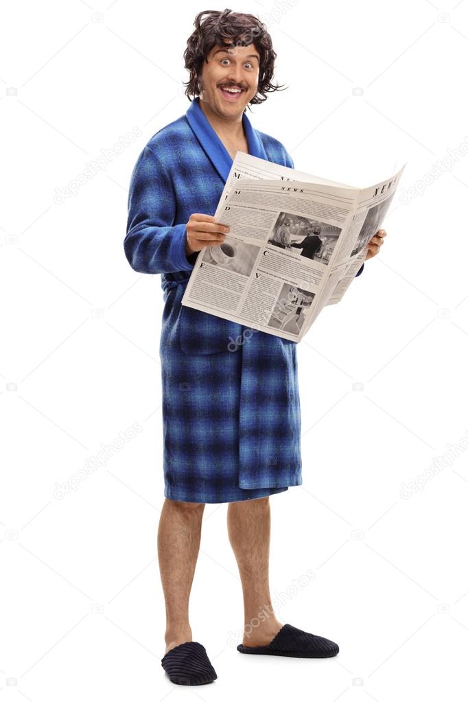 depositphotos_116965600-stock-photo-excited-man-holding-a-newspaper.jpg