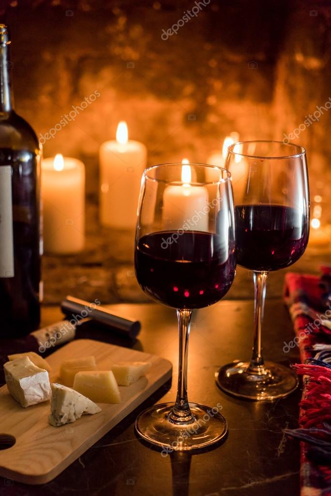 depositphotos_125029618-stock-photo-wine-and-fire-romantic-composition.jpg