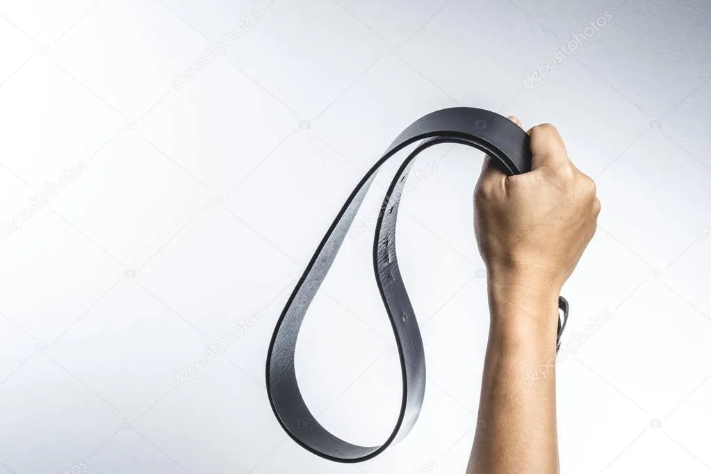 depositphotos_137963036-stock-photo-hand-holding-leather-belt-for.webp