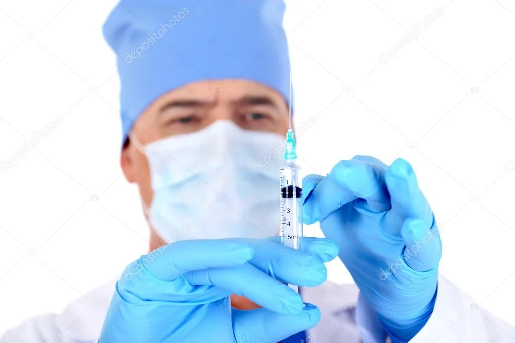 depositphotos_1462655-stock-photo-syringe-with-vaccine.webp
