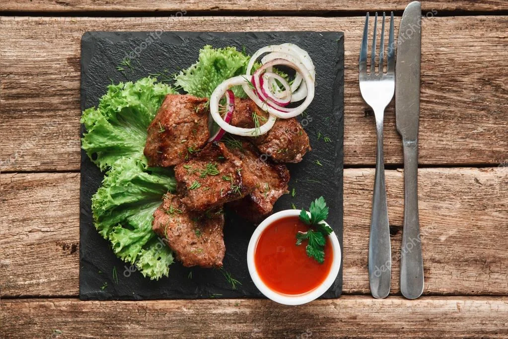 depositphotos_148213031-stock-photo-appetizing-grill-meal-kebab-served.webp