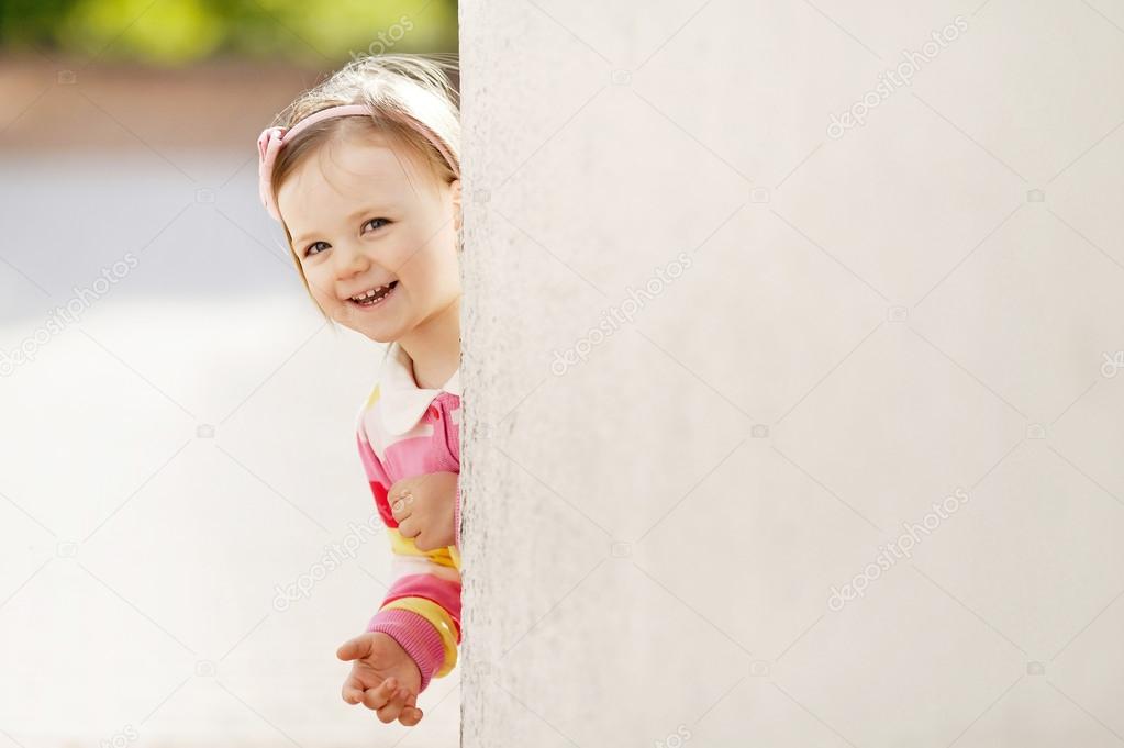 depositphotos_17214669-stock-photo-little-beautiful-girl-peeping-from.jpg