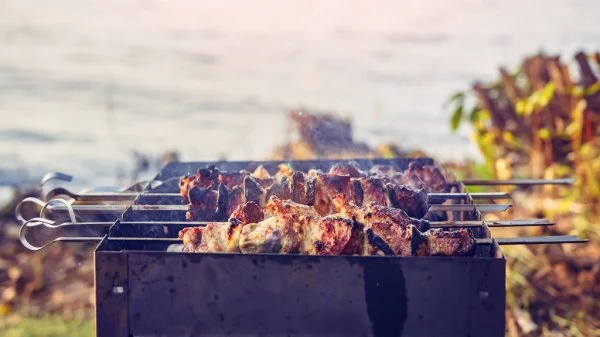 depositphotos_175757592-stock-photo-shish-kebabs-on-skewers-to.webp