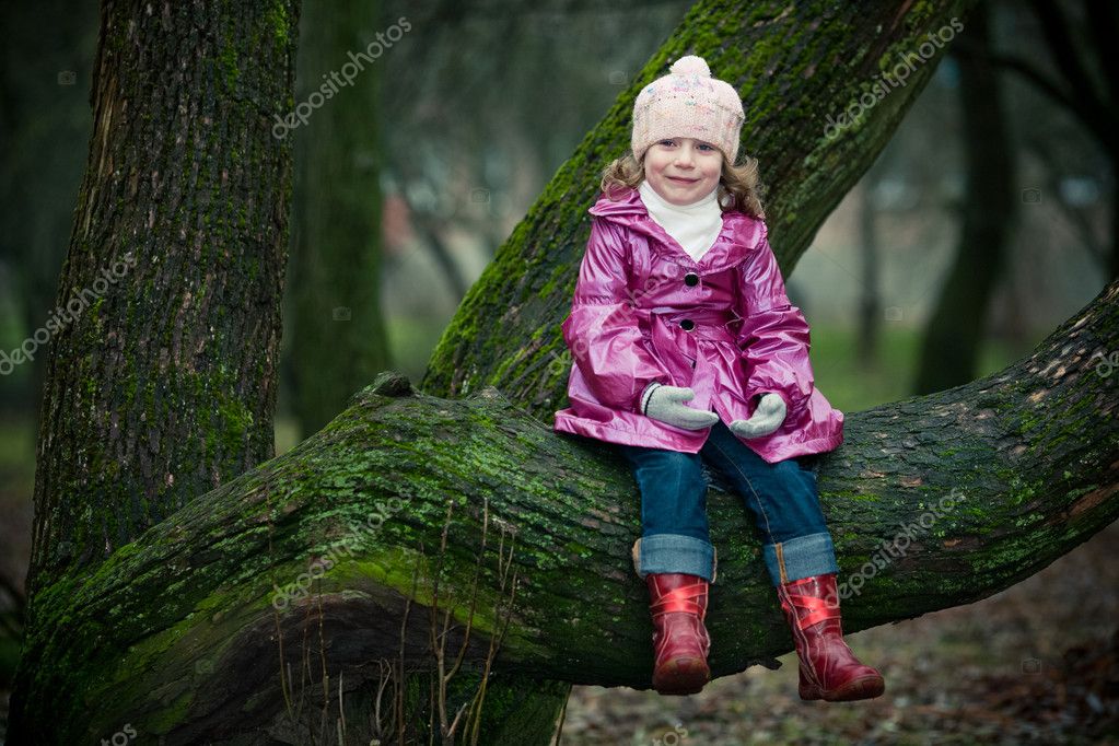 depositphotos_1889707-stock-photo-girl-sits-on-a-tree.jpg