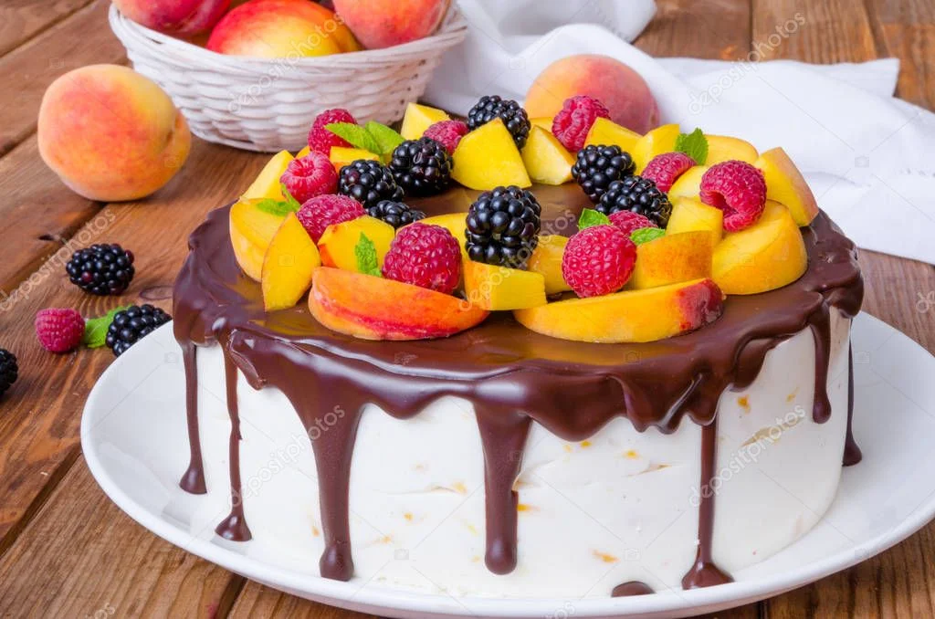 depositphotos_198156140-stock-photo-vanilla-mousse-cake-peaches-chocolate.webp