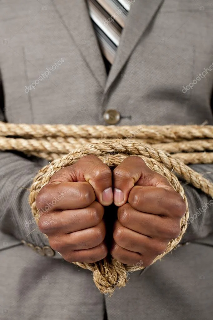 depositphotos_23797003-stock-photo-business-hands-tied-with-rope.webp