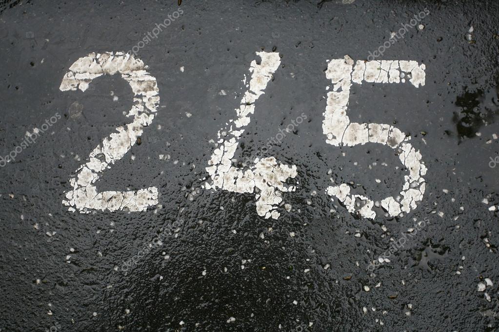 depositphotos_36167201-stock-photo-parking-number-painted-in-white.jpg