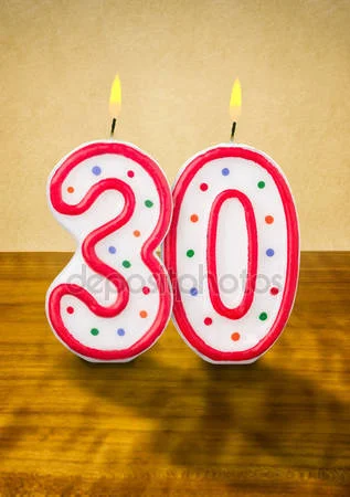 depositphotos_42526511-stock-photo-burning-birthday-candles-number-30.webp