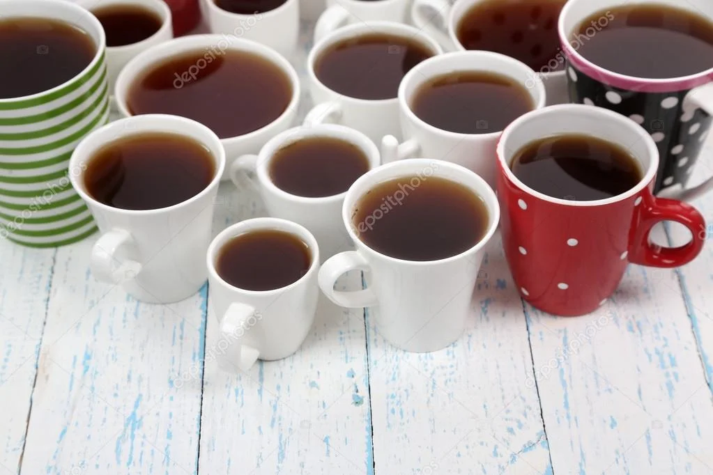 depositphotos_42761423-stock-photo-many-cups-of-tea-on.webp