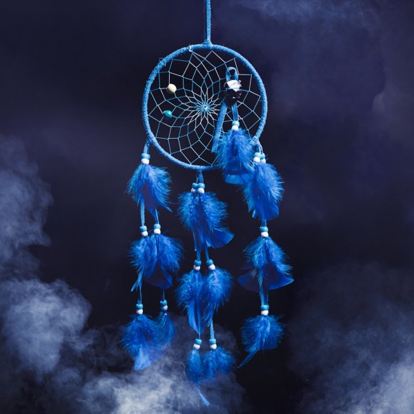 depositphotos_45904669-stock-photo-dream-catcher-on-a-dark.jpg