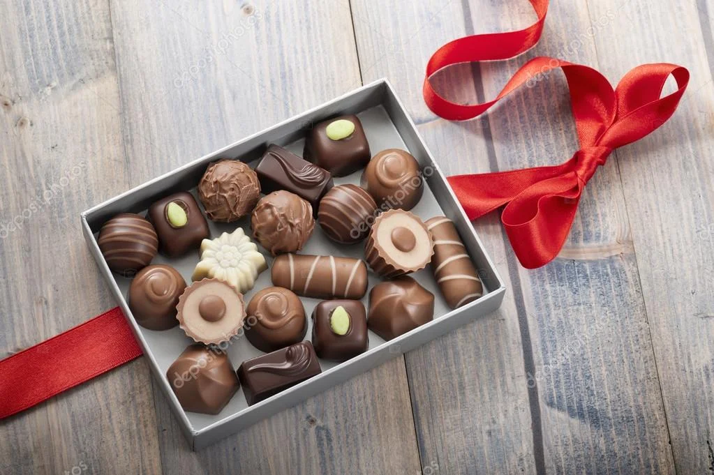 depositphotos_45925111-stock-photo-chocolates.webp