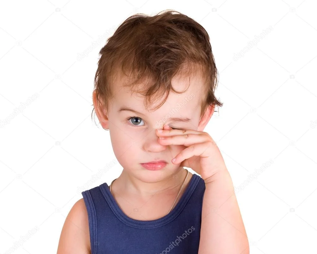 depositphotos_5169323-stock-photo-a-tired-little-boy-rubbing.webp