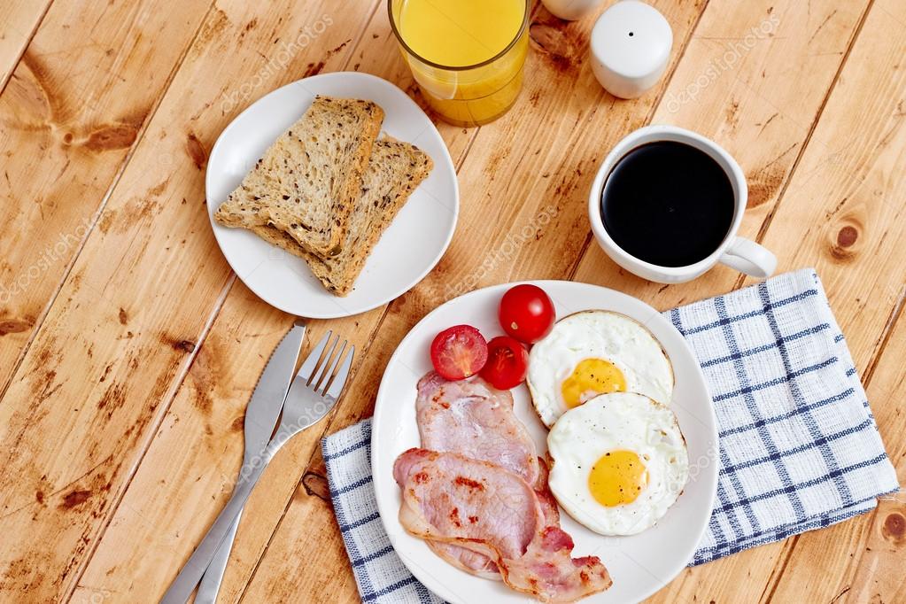 depositphotos_52688973-stock-photo-breakfast-with-fried-eggs-bacon.jpg