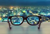 depositphotos_54787101-stock-photo-night-cityscape-focused-in-glasses.jpg