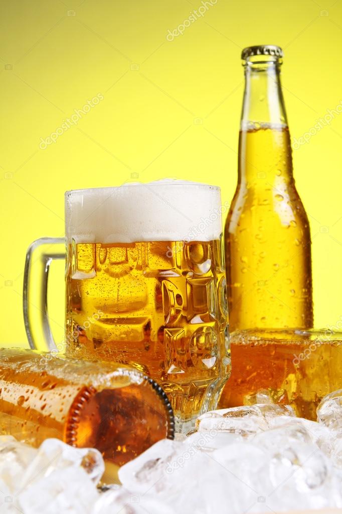 depositphotos_5716711-Glass-of-beer-with-foam-on-yellow-background.jpg