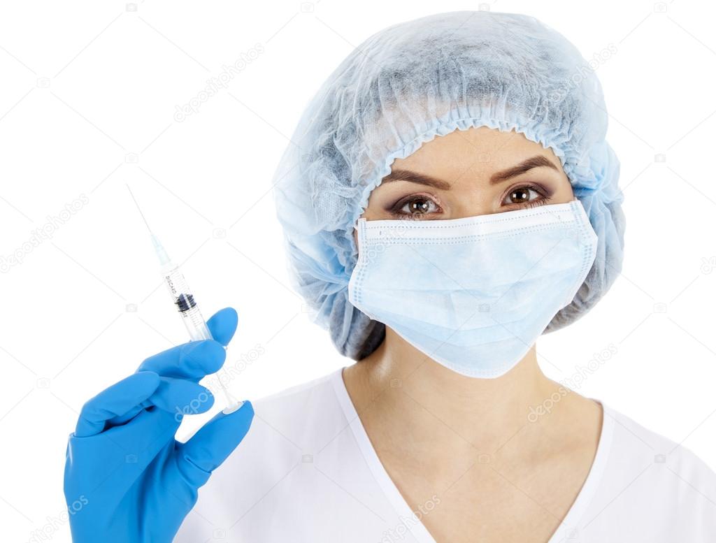 depositphotos_57486607-stock-photo-woman-doctor-with-a-syringe.jpg