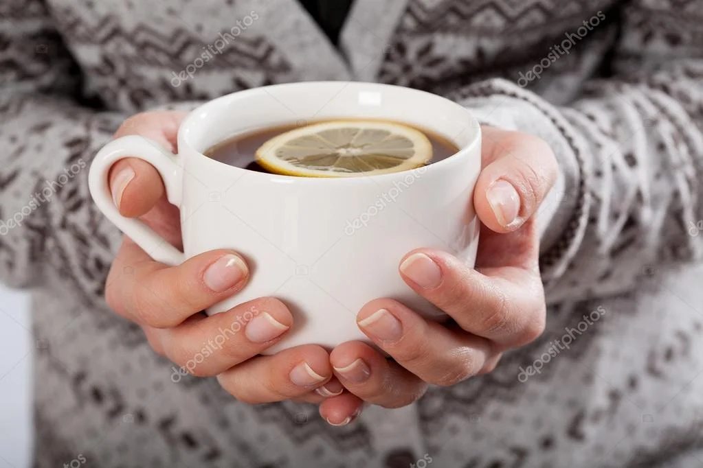 depositphotos_58185091-stock-photo-hands-holding-a-cup-of.webp