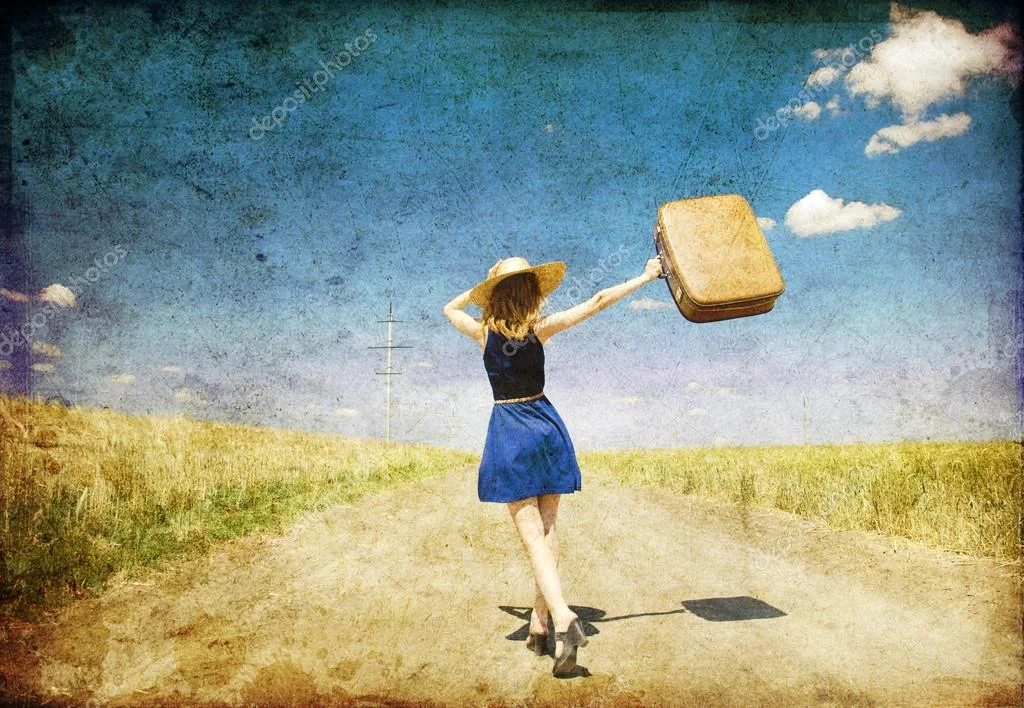 depositphotos_6421168-stock-photo-lonely-girl-with-suitcase-at.webp