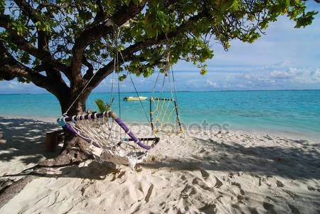 depositphotos_6808278-stock-photo-two-hammocks-and-sea.webp