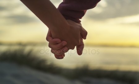 depositphotos_73407649-stock-photo-couple-holding-hands-on-a.jpg