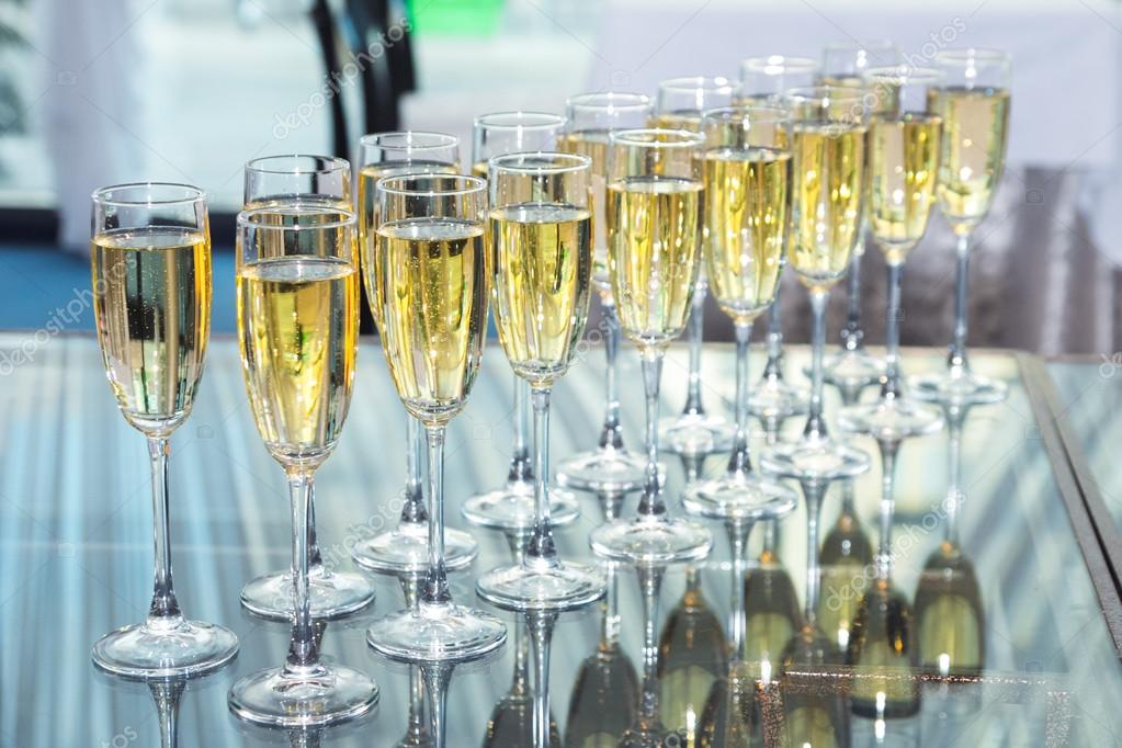 depositphotos_77114711-stock-photo-elegant-glasses-with-champagne-standing.jpg