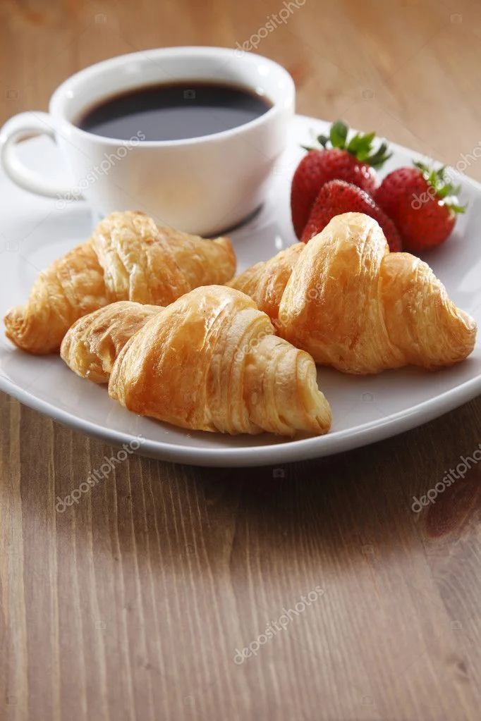 depositphotos_8287493-stock-photo-breakfast-with-coffee-and-croissant.webp