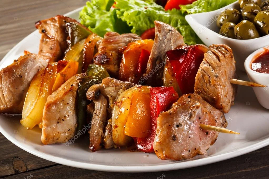 depositphotos_83920098-stock-photo-kebab-with-vegetables.webp