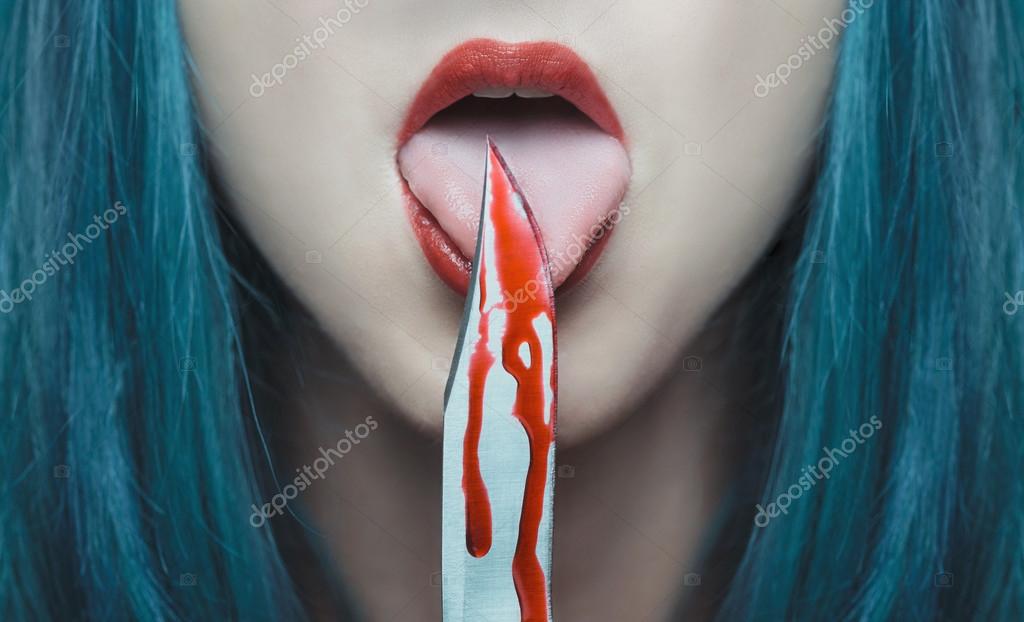 depositphotos_87834718-stock-photo-horror-woman-licking-a-knife.jpg