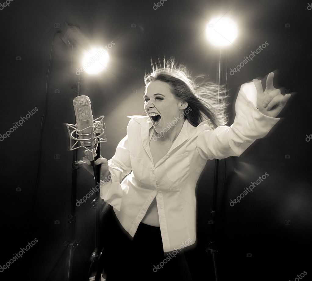 depositphotos_8881825-stock-photo-young-rock-and-roll-singer.jpg