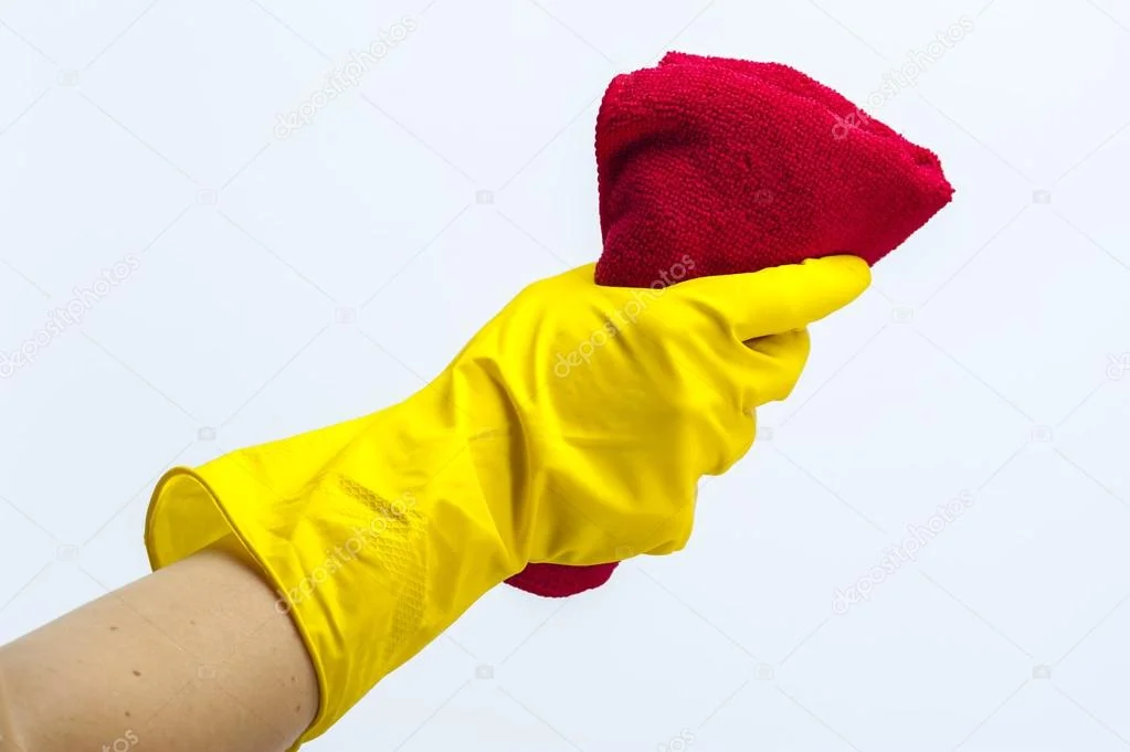 depositphotos_98932236-stock-photo-hand-in-yellow-glove-holding.webp